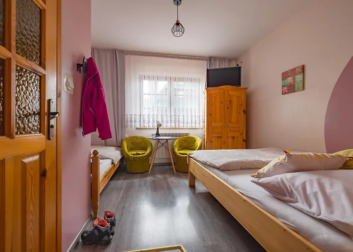 Budget - Tanie Burtek ホームステイ